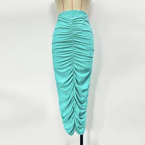 Elegant turquoise ruched midi skirt featuring delicate rhinestone embellishments and a slim fit.