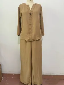 Two-piece women's casual lounge set with V-neck long sleeve top and wide leg pants.