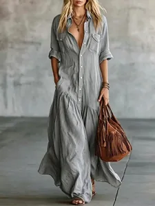 Casual grey long sleeve button-up maxi dress with collar and pockets for boho chic look