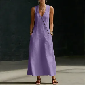 Detail shot of a purple cotton linen maxi dress featuring a V-neck and diagonal buttons.