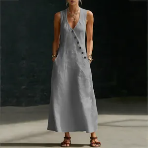 Detail shot of a sleeveless V-neck cotton linen maxi dress with side button design