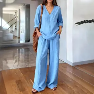 Light blue casual two-piece washed cotton set with V-neck top and wide-leg trousers