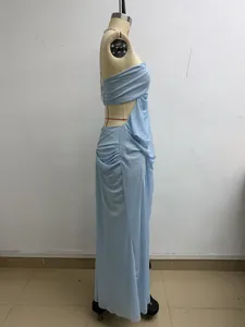 Side profile of a light blue mesh halter neck resort maxi dress on a professional mannequin