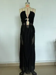 Close-up detail of sexy black mesh sheer halter neck maxi dress for vacation style