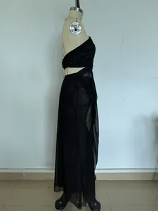 Elegant black mesh see-through halter dress on mannequin for sexy summer resort style
