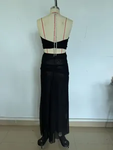 Detail of sexy black sheer mesh backless dress with crystal chain decoration