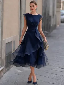 Elegant navy blue mesh midi dress featuring a stylish multi-layered ruffle skirt