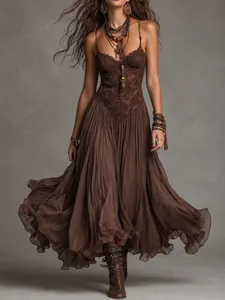 Detail view of a vintage chocolate brown lace patchwork slip dress in bohemian style