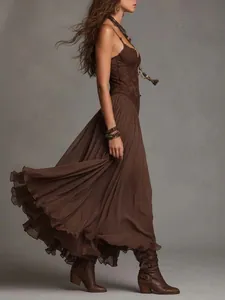 Side view of bohemian brown lace patchwork camisole maxi dress with pleated skirt