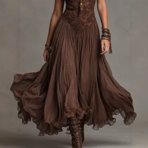 Vintage brown bohemian maxi dress with lace patchwork and pleated flowing skirt