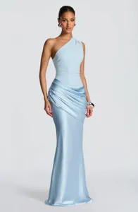 Close-up showing the elegant draping and ruched detail of a light blue one-shoulder evening gown