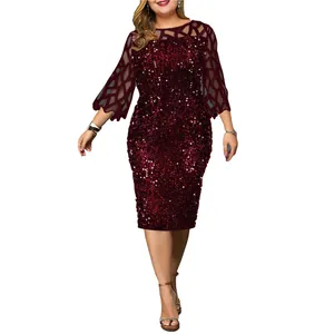 Detail view of the shimmering sequins and mesh lattice sleeves on this burgundy party dress