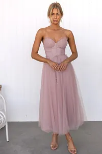 Elegant dusty pink spaghetti strap mesh evening dress with corset bodice detail
