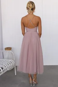 Elegant mauve midi evening gown dress featuring a delicate mesh skirt and criss-cross back design
