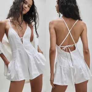 Stylish white denim romper for women featuring deep V-neck and criss-cross backless design