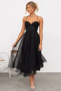 Elegant black tulle evening dress with spaghetti straps and corset bodice detail