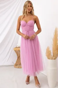Elegant pink tulle spaghetti strap evening dress with a ruffled bustier bodice for women.