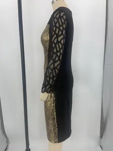 Side profile of elegant gold sequin bodycon dress featuring black mesh geometric sleeves