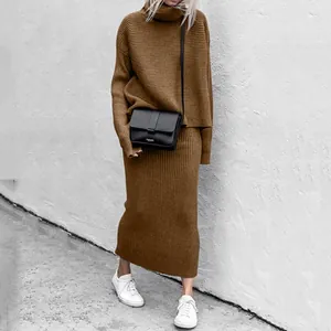 Close-up of brown ribbed knit two-piece set featuring turtleneck sweater and long skirt
