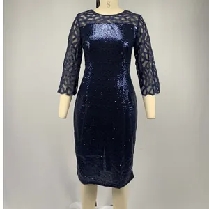 Close-up detail of navy blue sequined party midi dress with mesh patchwork sleeves