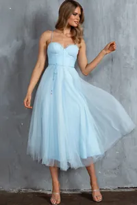 Full length view of elegant light blue spaghetti strap tulle evening dress with corset bodice
