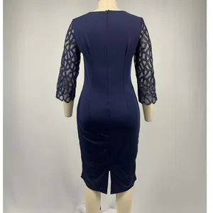 Back view of navy blue slim-fit dress with mesh geometric lace 3/4 sleeves