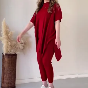 Conjunto casual de dos piezas de punto rojo con top oversize de murciélago y leggings