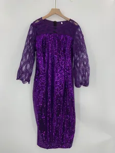 Close-up detail of the shimmering purple sequins and geometric mesh sleeve design.