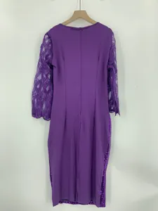 Back view of purple slim-fit party dress with mesh lace sleeves and sequin hem details