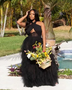 Elegant black mesh tulle evening gown with halter neckline and corset bodice detail