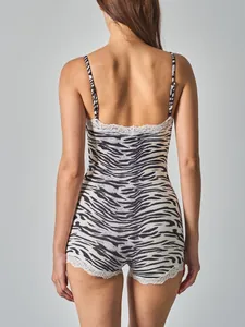 Back view of a tiger print camisole bodysuit with white lace trim and slim fit design.
