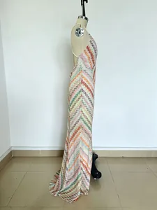 Side view of a slim-fit backless maxi dress with colorful zigzag print for women