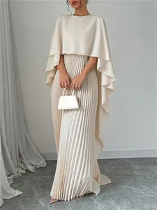 Elegant cream-colored batwing sleeve cape top paired with pleated maxi skirt set for women