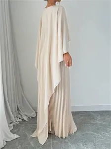Elegant cream pleated two-piece set featuring batwing sleeves and a maxi skirt