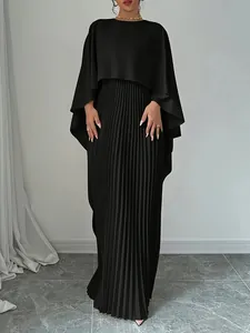 Full detailed view of elegant black pleated two-piece set with batwing sleeve top