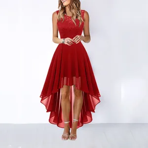 Detailed view of the red lace bodice and high-low chiffon hemline of the elegant evening dress.