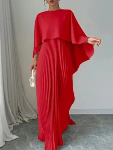 Elegant red batwing sleeve cape top paired with a long pleated maxi skirt set for women