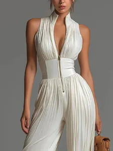 Detailed shot of an elegant white pleated sleeveless jumpsuit with a gold zipper