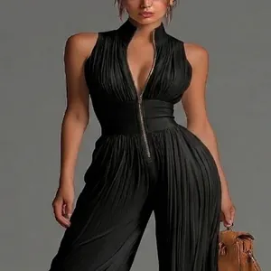 Close-up of black sleeveless pleated wide-leg jumpsuit with deep V-neck zipper
