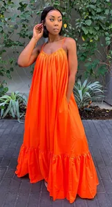 Elegant orange spaghetti strap maxi dress with loose tiered ruffle hem design