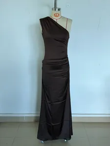 Elegant dark brown one-shoulder pleated satin slim-fit maxi dress displayed on a mannequin