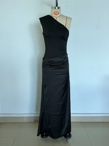 Elegant black one-shoulder satin maxi dress with pleated waist detail for women.