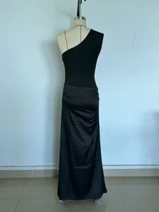 Full back view of the black evening dress showing the satin fabric drape and bodycon silhouette