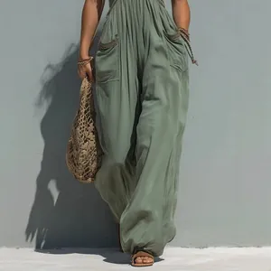 Mono sin mangas de estilo boho chic en color sólido con bolsillos laterales y pierna ancha