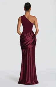 Back view of an elegant burgundy one-shoulder pleated satin long dress for women