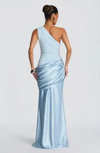 Back view of elegant light blue one-shoulder satin gown with draped pleated details