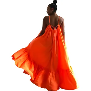 Back view of a vibrant orange backless sleeveless maxi dress with a ruffled hem.