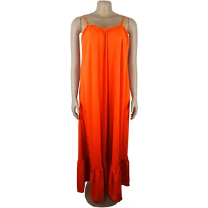 Detailed view of vibrant orange sleeveless camisole maxi dress featuring a stylish ruffled hem