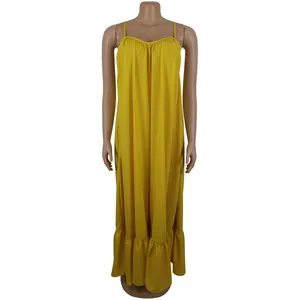 Front view of a loose yellow spaghetti strap maxi dress with ruffled hem