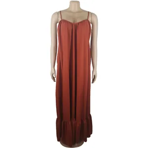 Elegant burnt orange spaghetti strap maxi dress featuring loose fit and tiered ruffle hem.